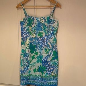 Lily Pulitzer blue and green print dress with tie back.